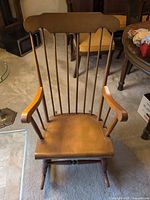 Front view of SK Wood spindle-back rocking chair