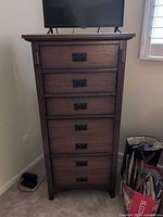 Full view of 5-drawer tall chest with metal pulls