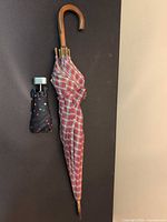 Full view of both umbrellas hanging