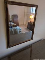 Full view of rectangular mirror on wall