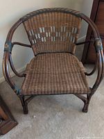 front view of brown wicker armchair