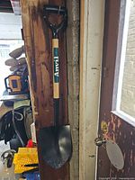 Full view of shovel hung vertically