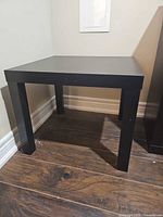 Front angled view of black side table