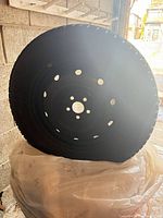 Front view of rim showing 5-lug pattern and rim condition