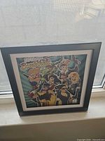 Front view of framed DC Comics Bombshells print