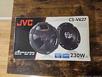 Sealed retail box front showing model, size, power ratings