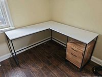 Full view of L-shaped desk setup