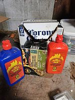 Royal Oak lighter-fluid bottles, firestarter box, Corona carton