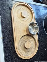 Full view of bamboo rimming tray with stainless bowl