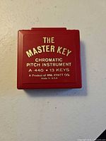 Closed red case front showing product information