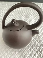 Teapot left side view showing overall form