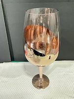 Full view of oversized blush glass goblet