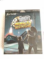 Front of box showing artwork and signature