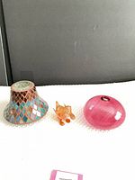 Full shot of the three glass pieces displayed side by side