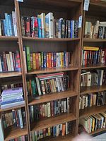 Front view of full bookshelf loaded with books