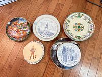 Group shot of all five decorative plates front view