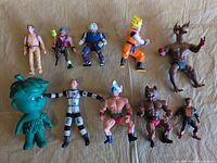 Full lot of 10 assorted figures laid out