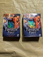 Front view of two sealed Fantastic Four VS System starter decks