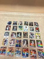 Full lot overview displaying all 30 baseball cards laid out in five‐by‐six grid