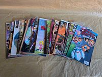 Front view of stacked lot of 30 independent comic books, top issue Speed Racer
