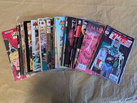 Stack of 30 bagged comic books showing assorted independent titles