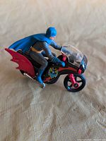 Side view of Batman on Batcycle showing colours and decals