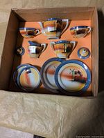 Full box view showing all porcelain pieces and layout