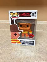 Front of boxed Funko Pop showing figure and EB Exclusive sticker