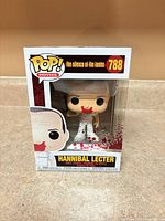 Front view of boxed Funko Pop showing character, figure number, variant