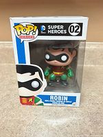 Front view of Robin Funko Pop! #02 in box