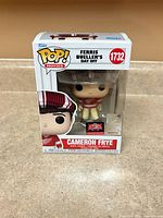 Front view of boxed Funko Pop Cameron Frye showing Target Con sticker and figure inside