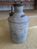 Full view of Imperial galvanized steel oil canister