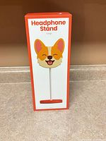 Front of boxed corgi headphone stand
