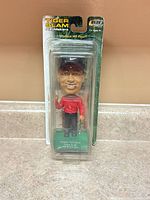 Front view of blister-packaged Tiger Woods bobblehead