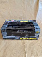 Front view of boxed Revell Bullitt 1968 Dodge Charger die-cast model