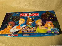 Closed game box showing Scooby-Doo Monopoly Fright Fest Edition cover art