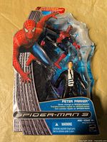 Front view of sealed Spider-Man 3 Peter Parker action figure blister pack