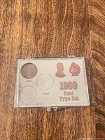 Holder closed, top view showing insert graphics and three cutouts