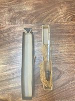 Hydrometer inside inner tray with tissue wrap, outer box lid alongside