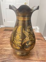 Full view of brass vase showing etched gilt floral design