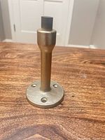 Front view showing full door stop and three mounting holes