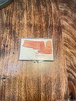 Closed holder front showing Sacagawea insert