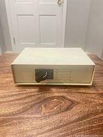 Front view showing rotary selector knob and label Data Transfer Switch