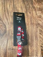 Front view of collar on Disney hang card showing overall appearance