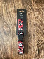 Front view of Disney Mickey Mouse large dog collar with tags attached