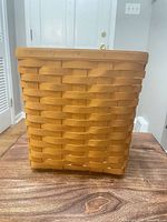 Side view of rectangular woven basket showing color and weave
