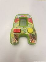 Front view of McDonald's ESPN tennis handheld game showing screen, buttons and graphics