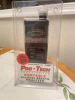 Front view of packaged Pro-Tech H-1000 breath analyzer