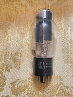 Full view of RCA Radiotron tube showing glass envelope and branding