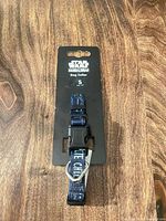 Front view of collar on retail card